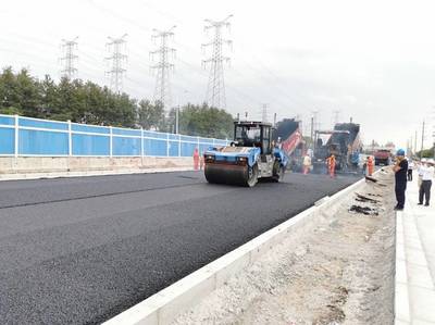 昆陽路越江大橋主線通車 公路與路面工程成果豐碩，年底有望實現行人過橋